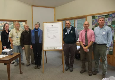 Kennebec Woodland Partnership Key Principles signing, October 2010 Conference.  From left:  Dale Finseth (KCSWCD), Patrick Strauch (MFPC), Theresa Kercnher(KLT), Jake Metzler (FSM), Don Mansius (MFS), Tom Doak (SWOAM).   Not pictured:  Beth Ollivier (TCNEF).  Photo credit: Andy Shultz